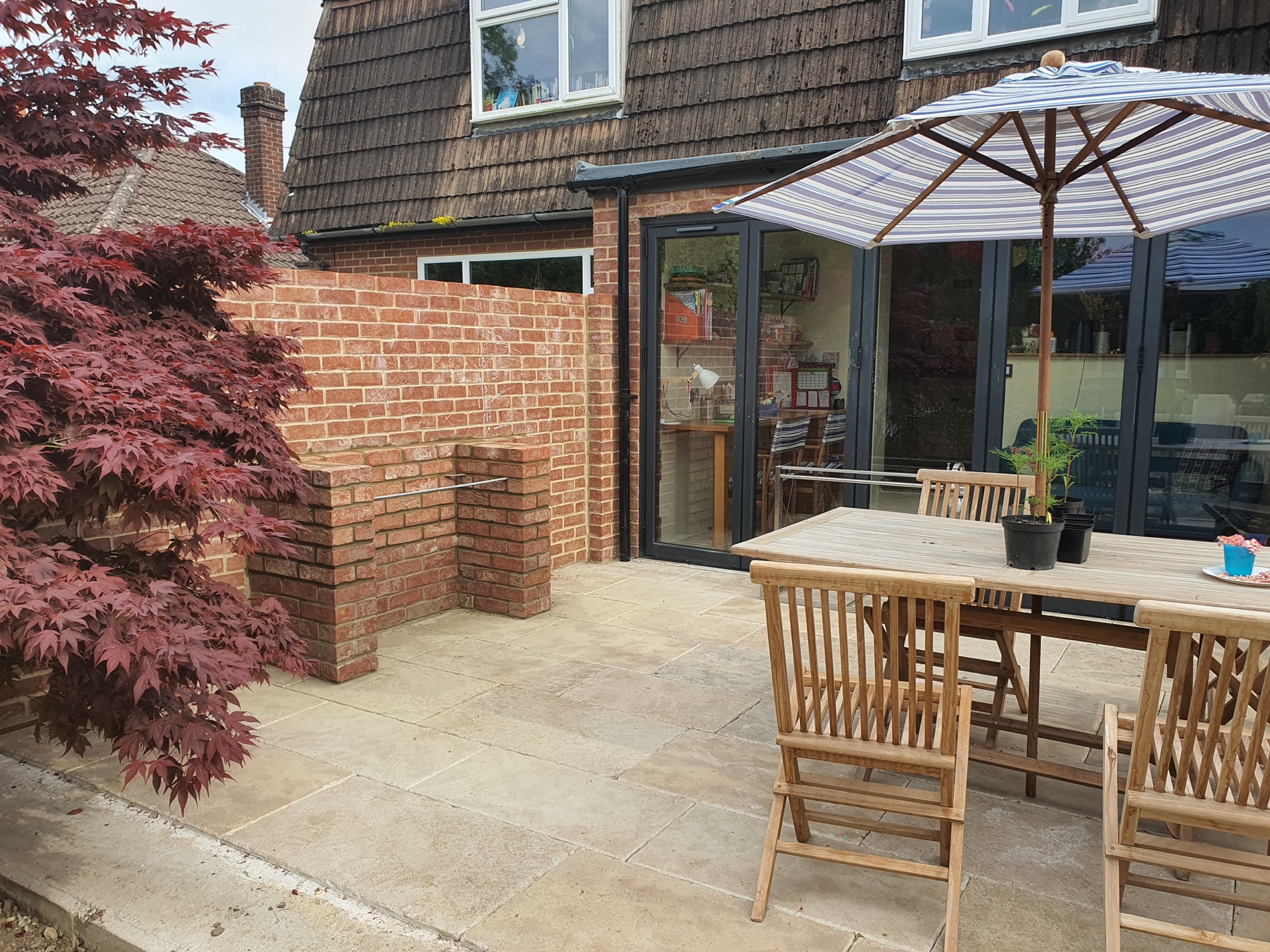 Residential extension completed patio and rear elevation